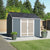 Shed in a backyard with two pots outside  Shed in a backyard with two pots outside