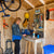 Interior shot of a women working at her workbench  Interior shot of a women working at her workbench