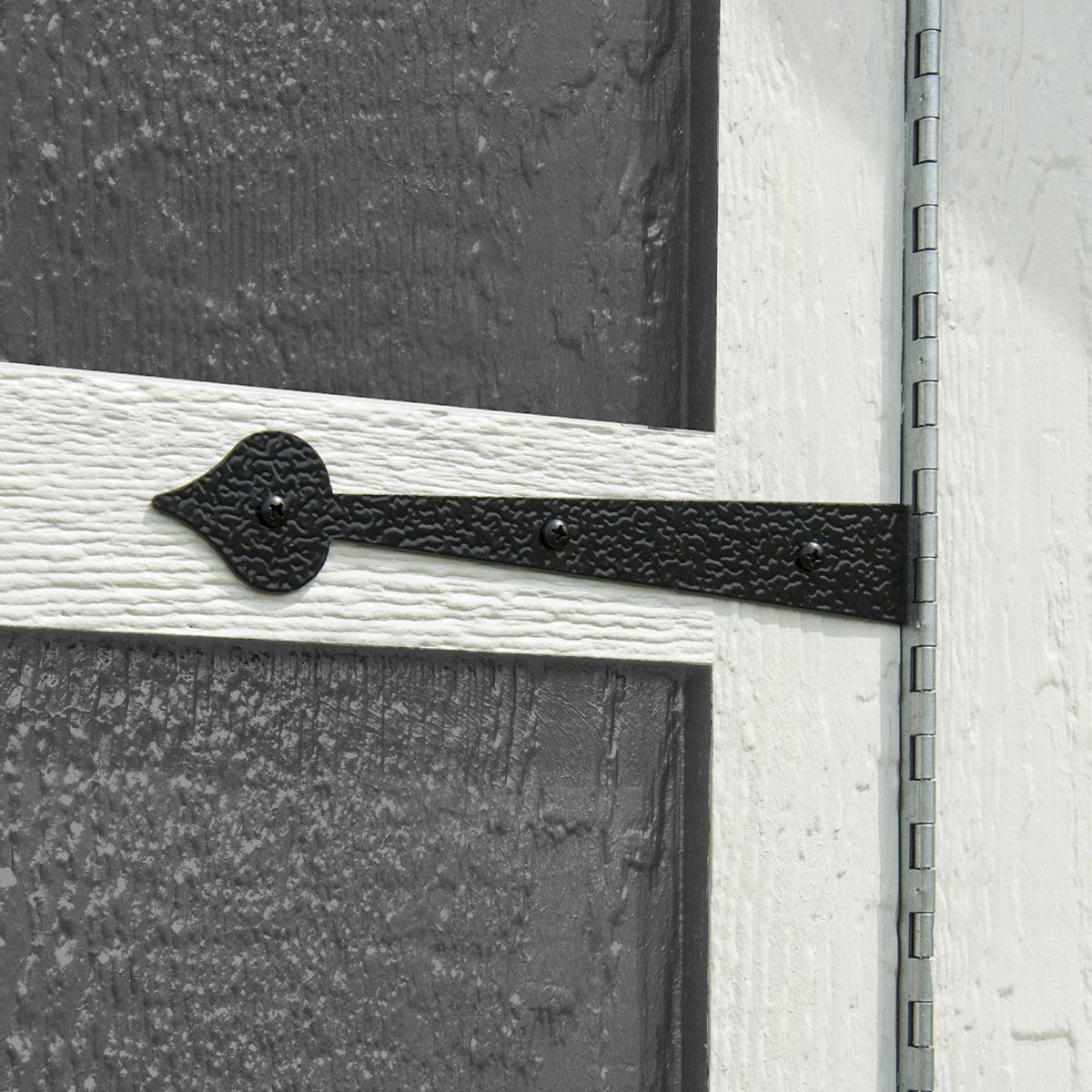 Close up of the faux hinges on the door 