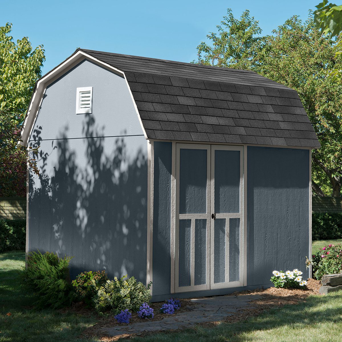 Barn style shed in a backyard