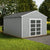 Large shed in backyard with gravel