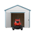 Storage shed with open double doors and a riding lawn mower parked at the entrance.